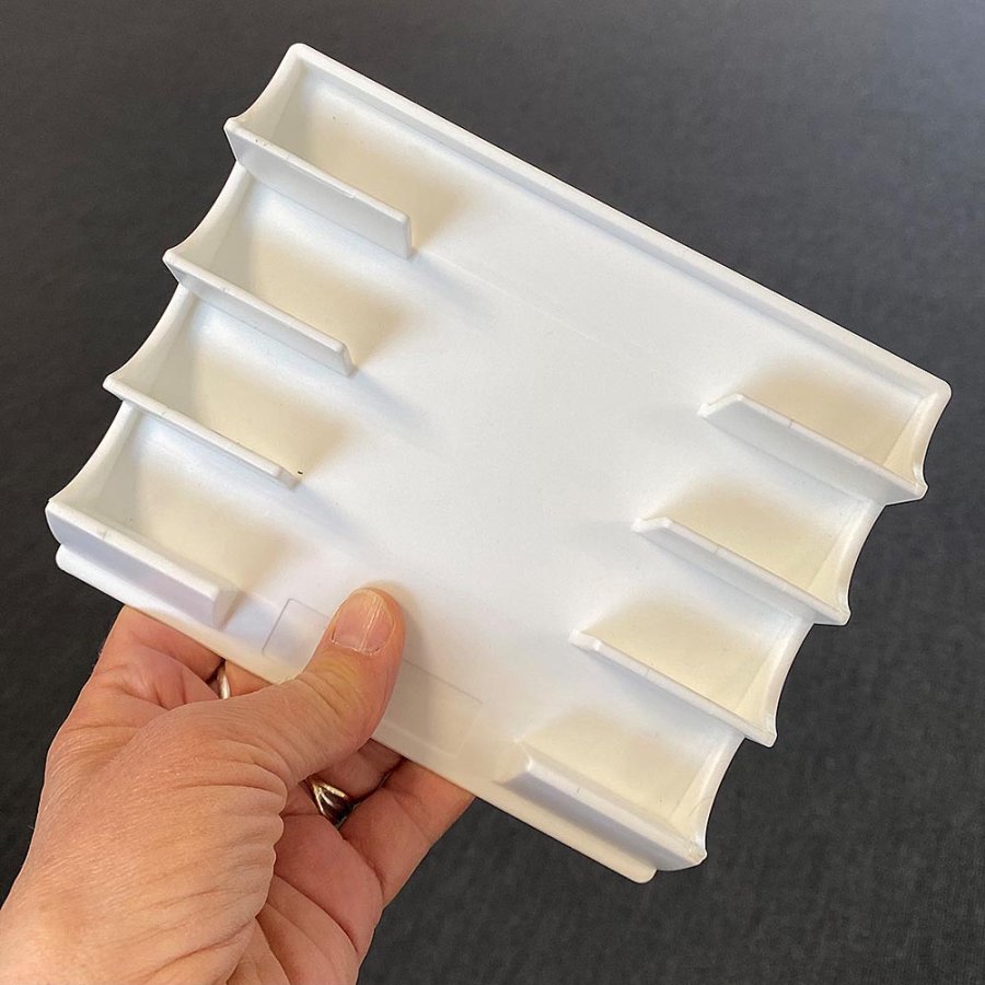 Magnetic pen holder for 4 pens, white plastic with 4 magnets on the back (also includes 4 adhesive pads)